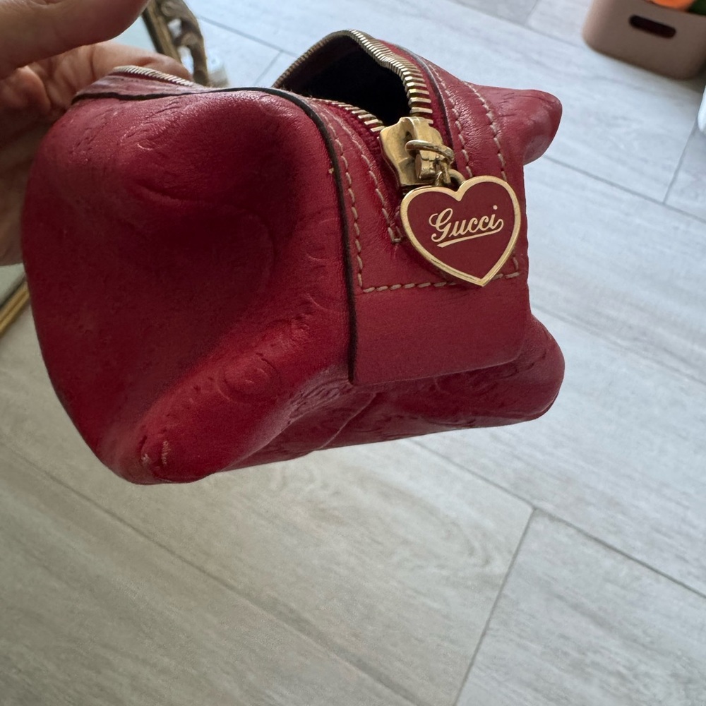 Gucci leather cosmetic bag.